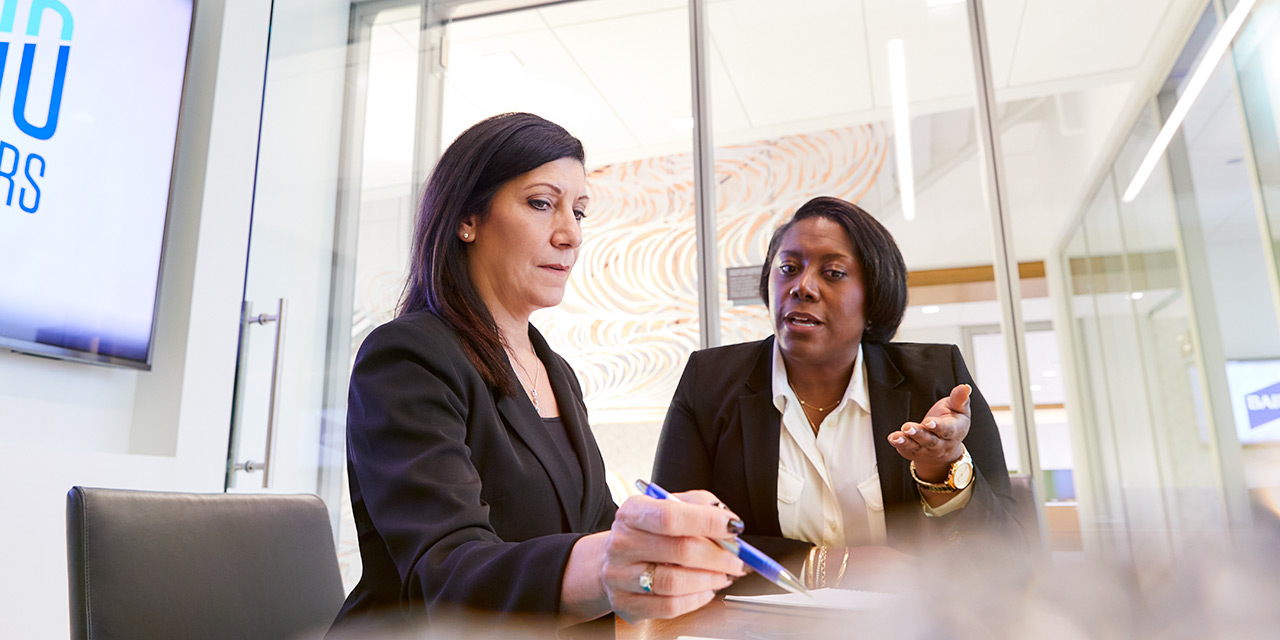 Photo of Jacci McCoy and Tammy Jelinek in Baird office